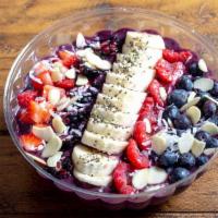 Acai Bowl · Blend of the açaí, banana, blueberries and pineapple juice. Topped with banana, berries, alm...
