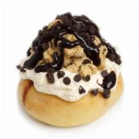 Cookie Monster Roll* · cream cheese frosting topped with homemade chocolate chip cookie dough, chocolate chips, and...