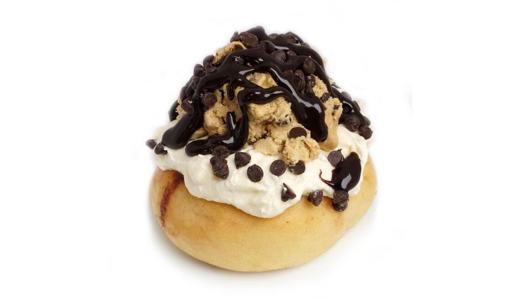 Cookie Monster Roll* · cream cheese frosting topped with homemade chocolate chip cookie dough, chocolate chips, and chocolate sauce