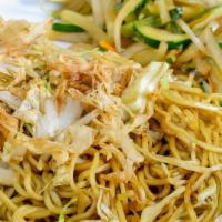 Yakisoba · Japanese sautéed noodles, mixed vegetables in a special sauce and sprinkled with sesame seeds.