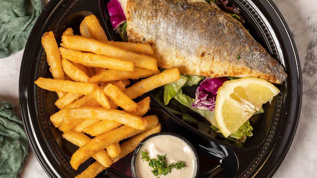 Branzino Whole Fish · Whole branzino fish grilled or fried fillet accompanied with rice and vegetables.