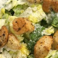 Small Caesar Salad · Romaine lettuce, parmesan cheese and croutons. Cesar dressing on side.