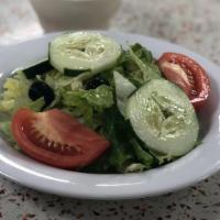 Small House Salad · Iceberg Lettuce with tomato wedges, black olives and cucumbers
