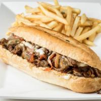 Philly Cheese Steak Sandwich · Philly steak, cheese, mixed peppers, and onions with horseradish mayo and fries.