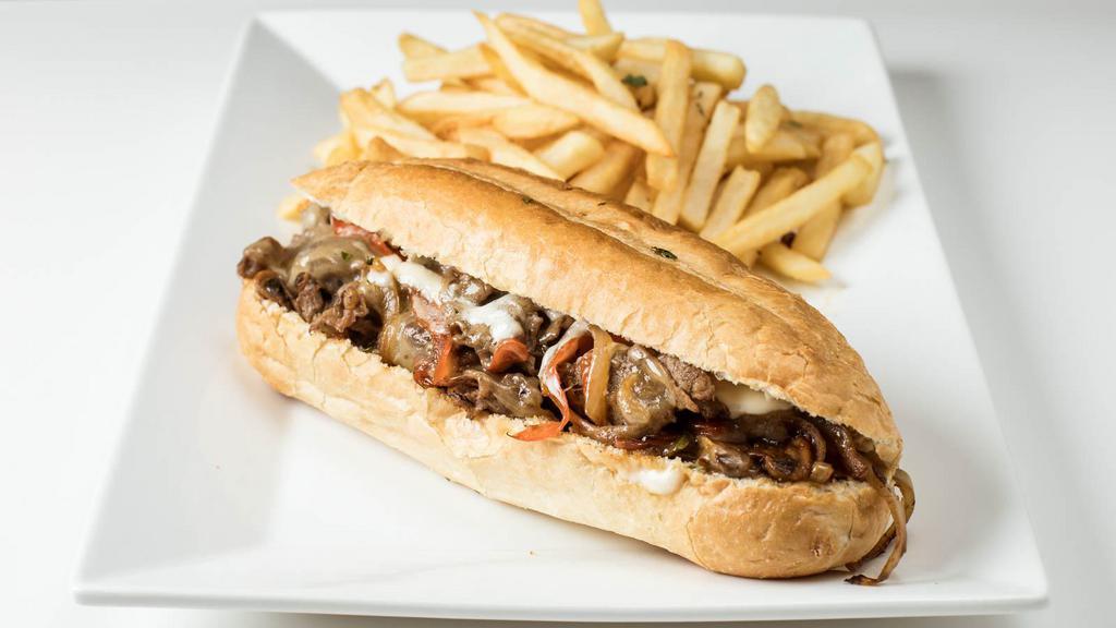 Philly Cheese Steak Sandwich · Philly steak, cheese, mixed peppers, and onions with horseradish mayo and fries.