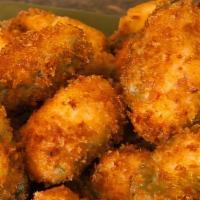 Fried Jalapeno Poppers  · with a stuffed cheddar sauce - Breaded