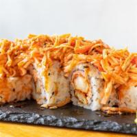 Miami Roll · Shrimp tempura, chopped crabstick, cream cheesse , sacllions, and masago. Topped with crabst...