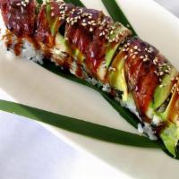 Dragon Roll · Shrimp, tempura, cucumber, topped with eel and avocado.