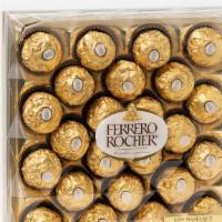 Ferrero Rocher Chocolate Box  · Elegant acrylic box with 48 pieces of chocolate