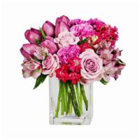 Precious Purples Arrangement · Deluxe.

Giving Beautiful Fresh Flowers Will Fill Her Day with Sunshine and Love. 

Includes...