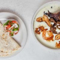 Border Dip · Large cheese dip with combination of grilled steak, chicken and shrimp with a side of pico d...