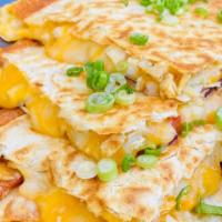 Chicken Quesadilla · Flour Tortilla with a Cheese Blend, Grilled Chicken Breast, and Pico de Gallo served with Gu...