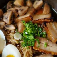Pork Belly Ramen · Egg noodles, Slow - Cooked Poached egg, Crispy Pork Belly, Green Onions, Mushrooms, and nori...