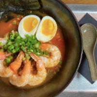 Shrimp Ramen · Egg noodles, slow cooked poached egg, wok seared butterfly shrimp, green onions, cilantro, a...