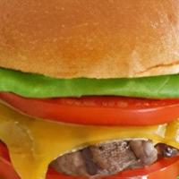 California Burger · Juicy beef patty with caramelized onions, avocado, lettuce, tomato, American cheese, and aio...