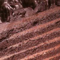 Chocolate Cake · Layer upon layer of dark chocolate cake, sandwiched with a silky smooth chocolate filling, p...