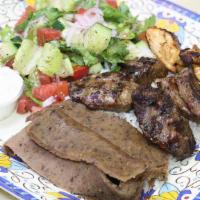 Mix Grill · Assortment of lamb shish, grilled chicken, beef gyro and kofte kebab.