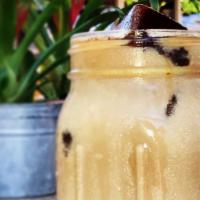The Alchemist Iced Coffee · 24hr cold brew from in-house roasted beans with 1 tbsp of condensed milk, brown sugar, and w...