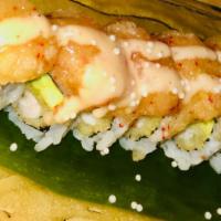 Volcano Roll · Shrimp tempura, avocado, topped with baked house sauce mixed crispy crunchy.
