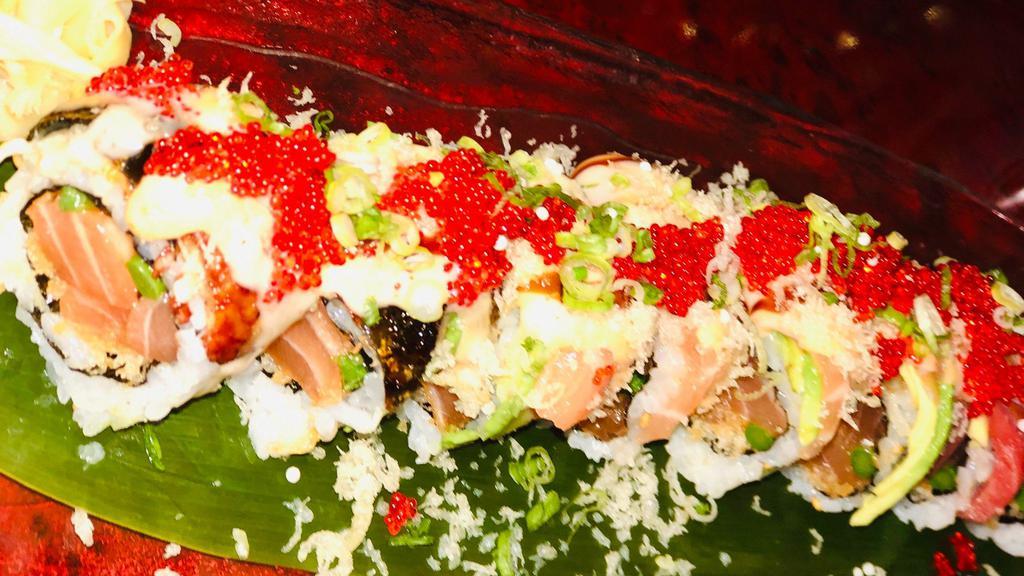 Paris Roll · Raw fish. Spicy crunchy salmon, asparagus, topped with eel, salmon, tuna, white fish, avocado, fish eggs, scallion, crunchy with chef's special sauce.