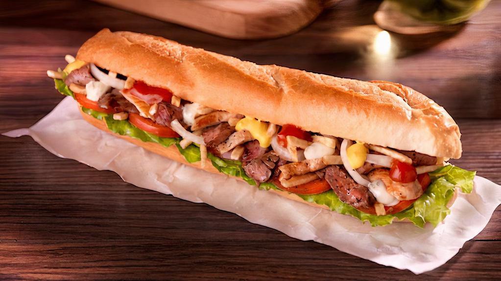 Pepito Mixed Sub · Lettuce, onions, tomatoes, potato sticks, mustard, ketchup, and engy sauce on a baguette bread Sub.