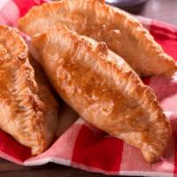 Empanada (Baked) Lebanese · Baked puff pastry dough filled with ground beef Mediterranean style.