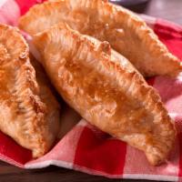Empanada (Baked) Spinach & Cheese · Baked puff pastry dough filled with spinach and cheese.