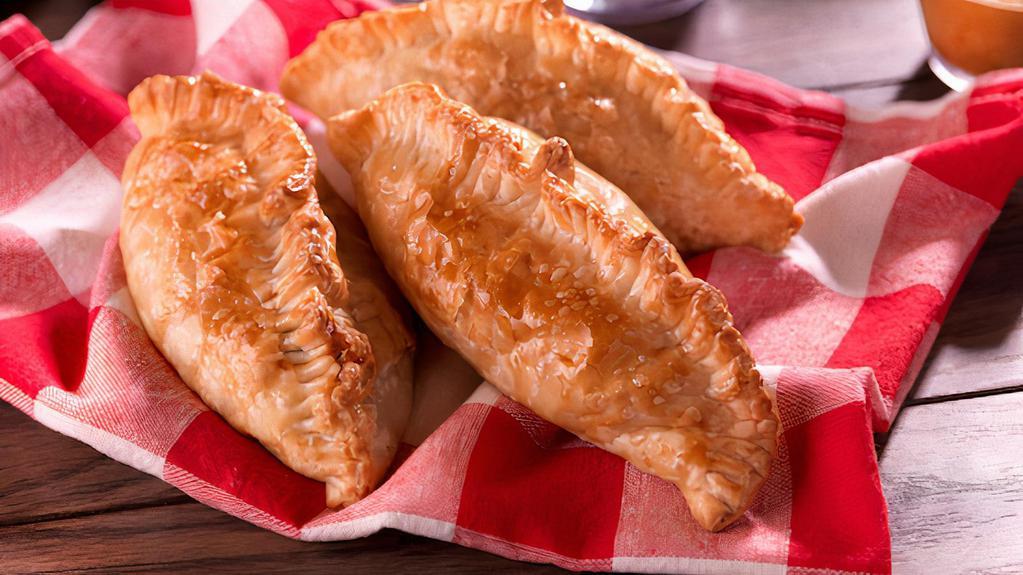 Empanada (Baked) Mushrooms & Cheese · Baked puff pastry dough filled with mushrooms and cheese.