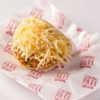 Arepa Catira · Arepa filled with shredded chicken and Gouda cheese.