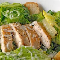 Chicken Caesar Salad · Grilled chicken over romaine and iceberg lettuce topped with parmesan cheese and croutons