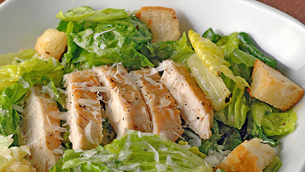 Chicken Caesar Salad · Grilled chicken over romaine and iceberg lettuce topped with parmesan cheese and croutons