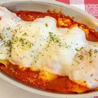 Stuffed Shells · Pasta shells stuffed with ricotta, spinach and herbs, baked in our tomato sauce and mozzarel...