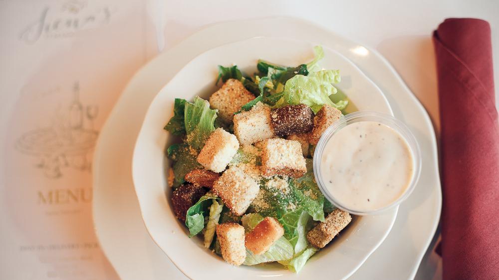 Side Caesar Salad · Tossed with Caesar dressing, croutons, romaine and Parmesan cheese.