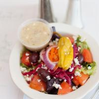 Side Greek Salad · Lettuce, tomatoes, onions, pepperoncini, kalamata olives, feta cheese and Greek dressing.