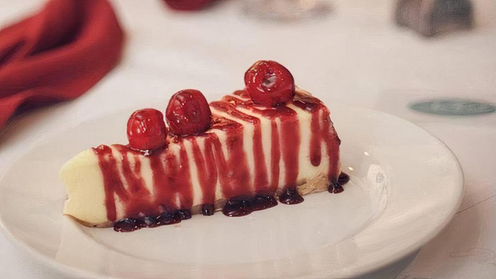 Cheesecake · New York style plain cheesecake topped with chef’s special sauce.