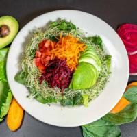 House Salad · Romaine, spinach, carrots, beets, tomato, alfalfa sprouts, sunflower, sprouts, avocado.