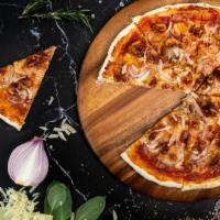 Bbq Chicken Pizza · Crispy chicken, red onion, BBQ sauce, and cheddar on a fresh baked pizza.
