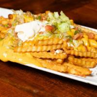 Loaded Fries · Choice of bacon, beef or chicken.