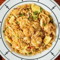 Seafood Fried Rice / Chaufa De Mariscos · Our amazing fried rice with calamari, shrimp and octopus.