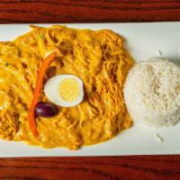 Aji De Gallina · Shredded chicken in a yellow Peruvian chile cheese sauce. Mildly spicy and very delicious. A...