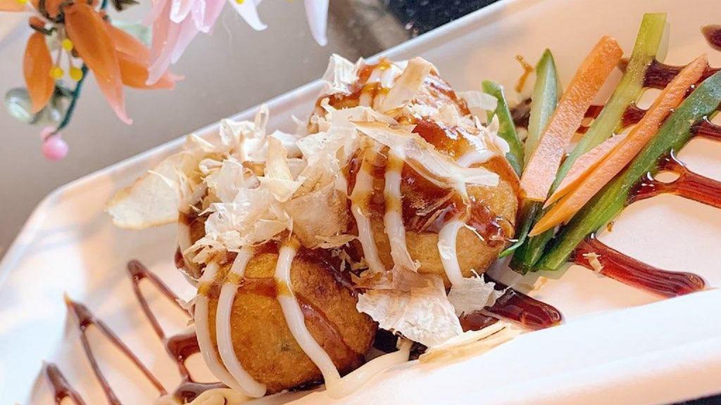 Takoyaki (Octopus Bites) · Fried octopus balls served with Japanese mayonnaise and takoyaki sauce with bonito flakes.