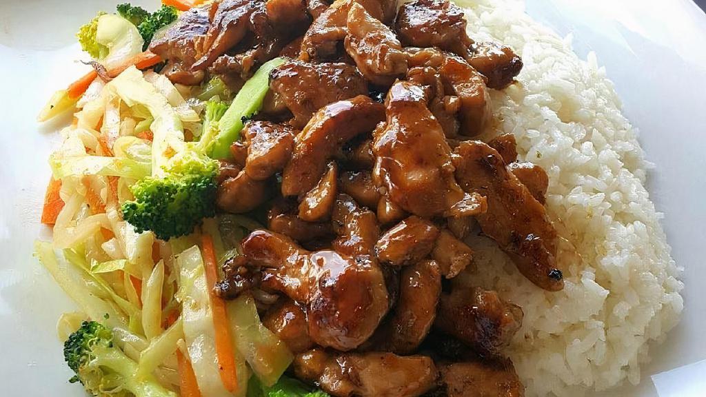 Chicken Teriyaki · Grilled chicken glazed with teriyaki sauce, served with grilled mixed vegetables and steamed rice