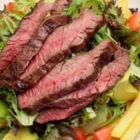 Prime Salad · Grilled skirt steak 6oz, mixed greens, avocado, tomato, house dressing. Served over french f...