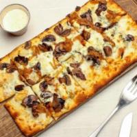 Mushroom Flatbread · Baked ricotta, mozzarella, parmesan, and blue cheese, mushrooms, and caramelized onions. Fin...