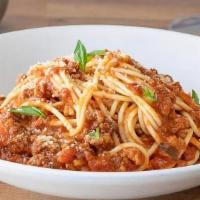 Pomodoro Prime · Spaghetti pasta served with tomato homemade sauce, ricotta cheese, and basil oil.