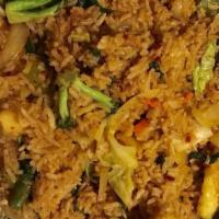 Thai Fried Rice  · Authentic Thai fried rice, meat or veggies, egg, peas, carrots, onions