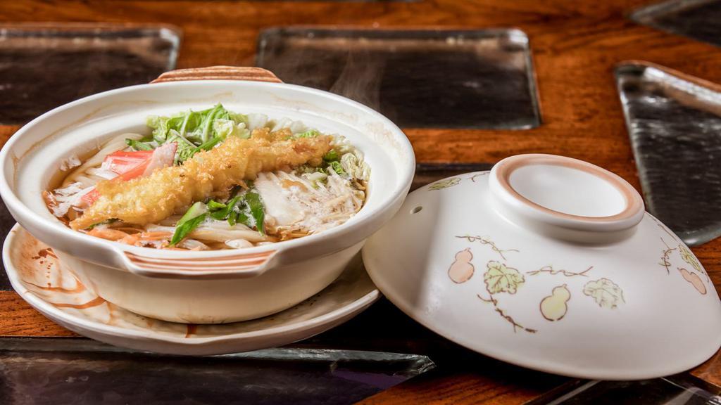 Nabegaki Udon · Udon noodles with vegetables, egg, krab, shrimp tempura in broth.