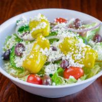 Greek Salad · Fresh iceberg and romaine, tomatoes, pepperoncini, Kalamata olives, onions, cucumbers, green...