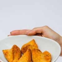 Samosas 4 Pcs · Potato and peas witha an authentic blend of spices stuffed into a triangular pastry served w...