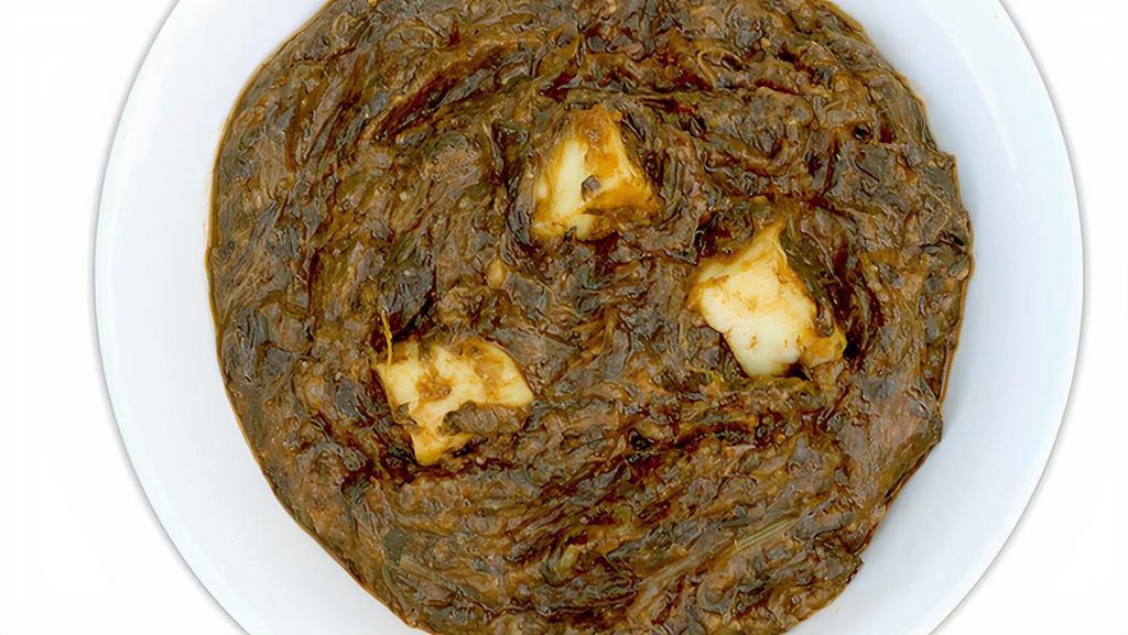 Saag Paneer Entree · Creamed Spinach with cubed Indian cheese. All Entrees come in a 16 oz portion, served with rice, raita